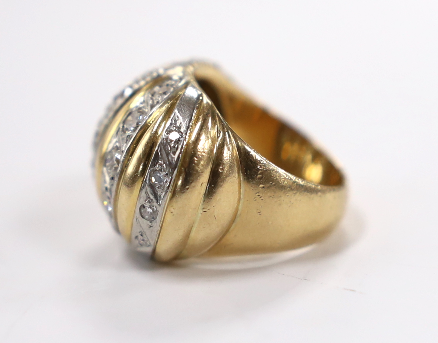 A yellow metal and diamond set five row line cluster set dress ring, size O, gross weight 17.7 grams.